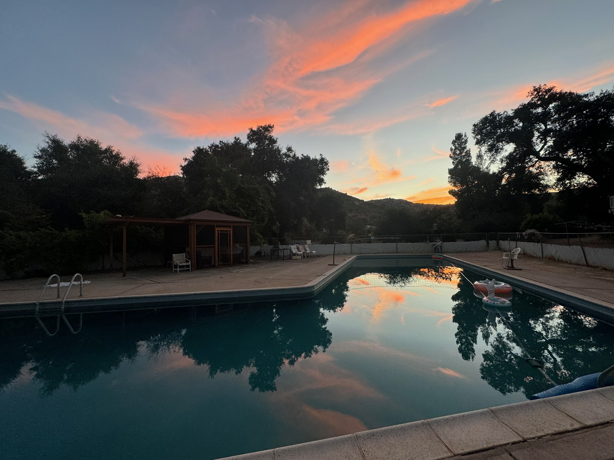 Family with the black dog at the ranch